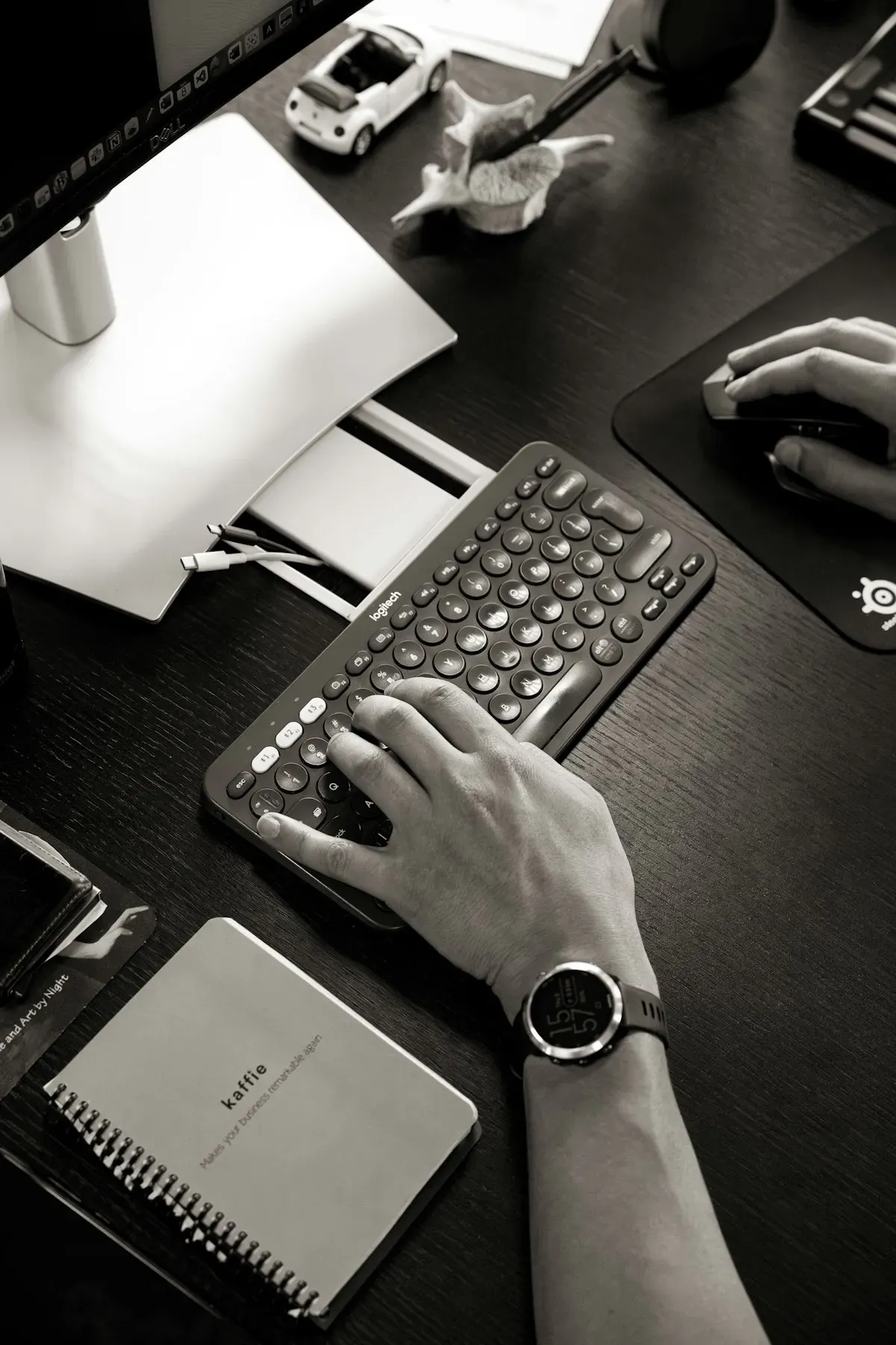 Hands typing on a typewriter