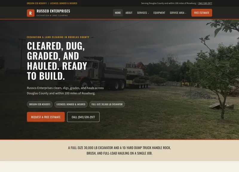 Russco Enterprises website showing excavation services, equipment, and contact options